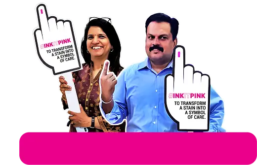 People holding inked finger signs promoting breast cancer screening awareness through the Ink It Pink healthcare campaign
